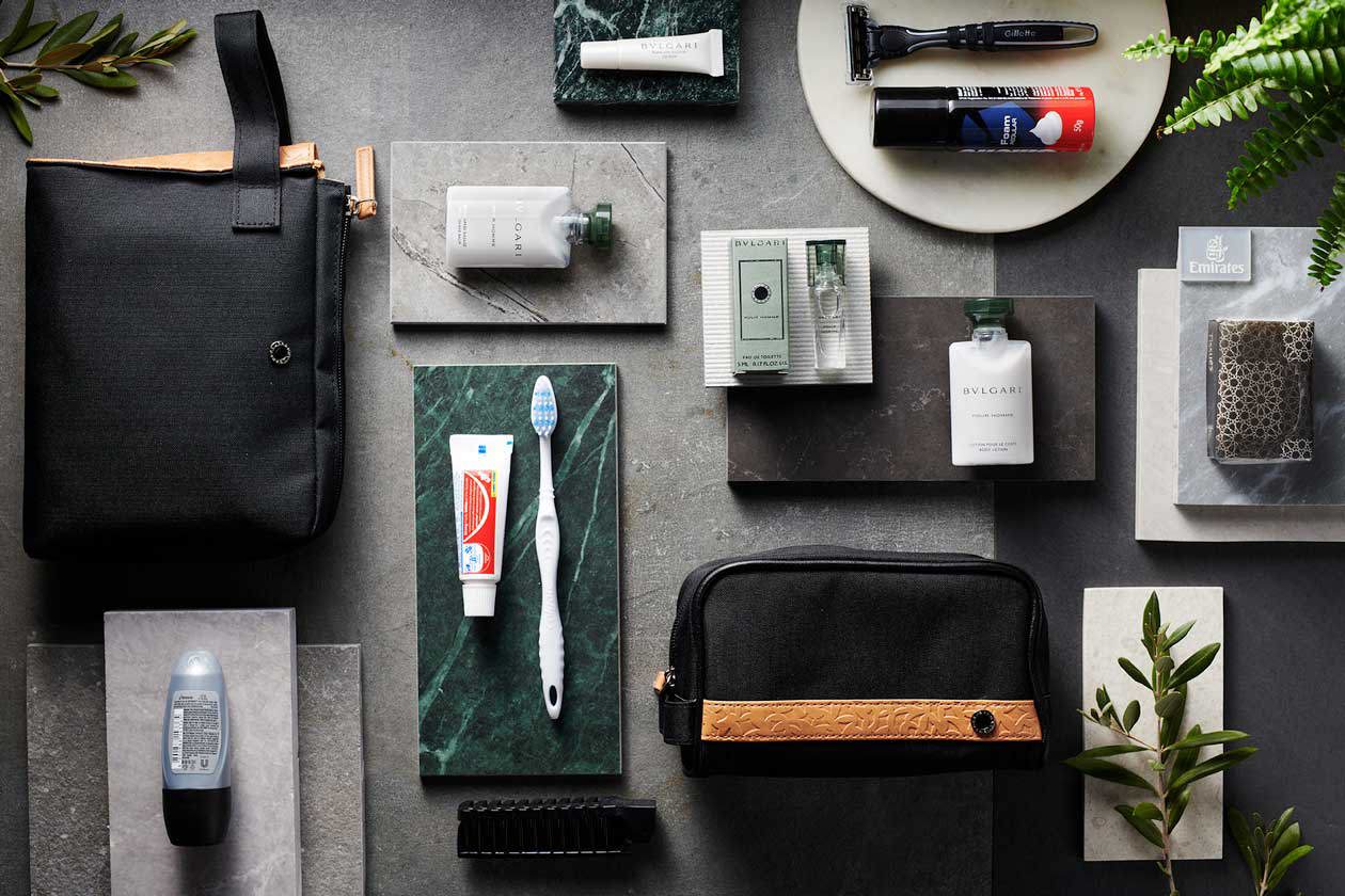 Emirates Business Class amenity kits 2023 - tan and black. Copyright © Ufficio Stampa Emirates Airlines / The Emirates Group