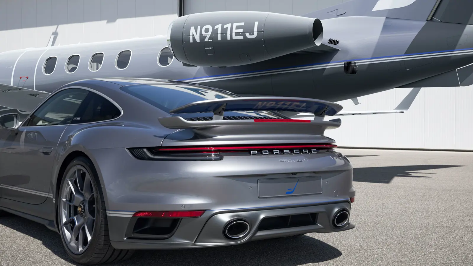 Special edition Embraer Phenom 300E business jet and customised Porsche 911 Turbo S.