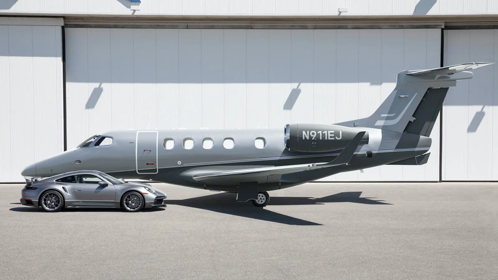 Special edition Embraer Phenom 300E business jet and customised Porsche 911 Turbo S.