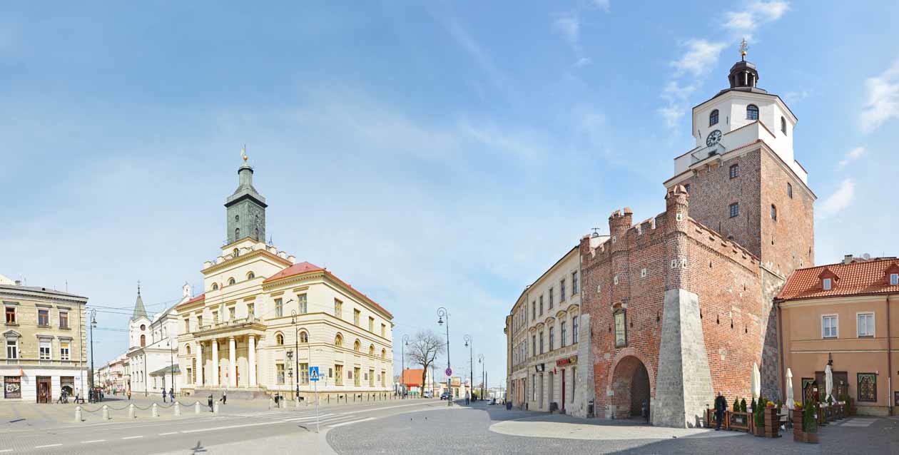 Lublin, on the left the New Town Hall and the Trinity Tower. Copyright © Sisterscom.com, Depositphotos 