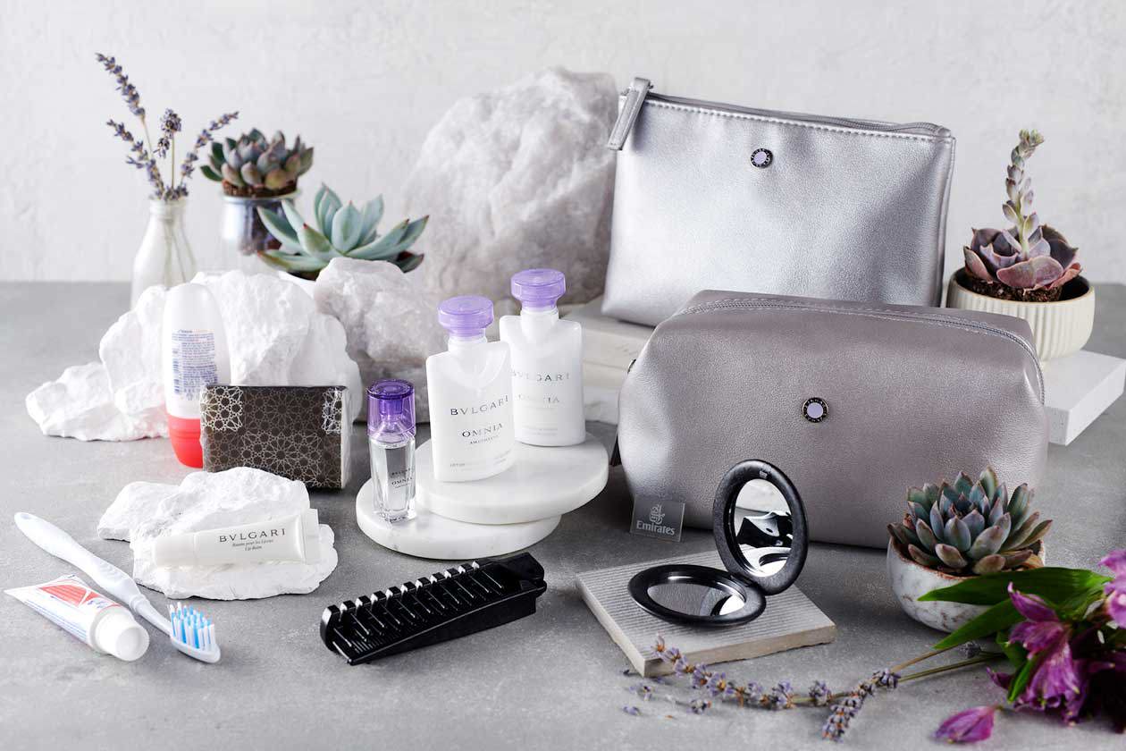 Emirates Business Class amenity kits 2023 - silver and lilac. Copyright © Ufficio Stampa Emirates Airlines / The Emirates Group