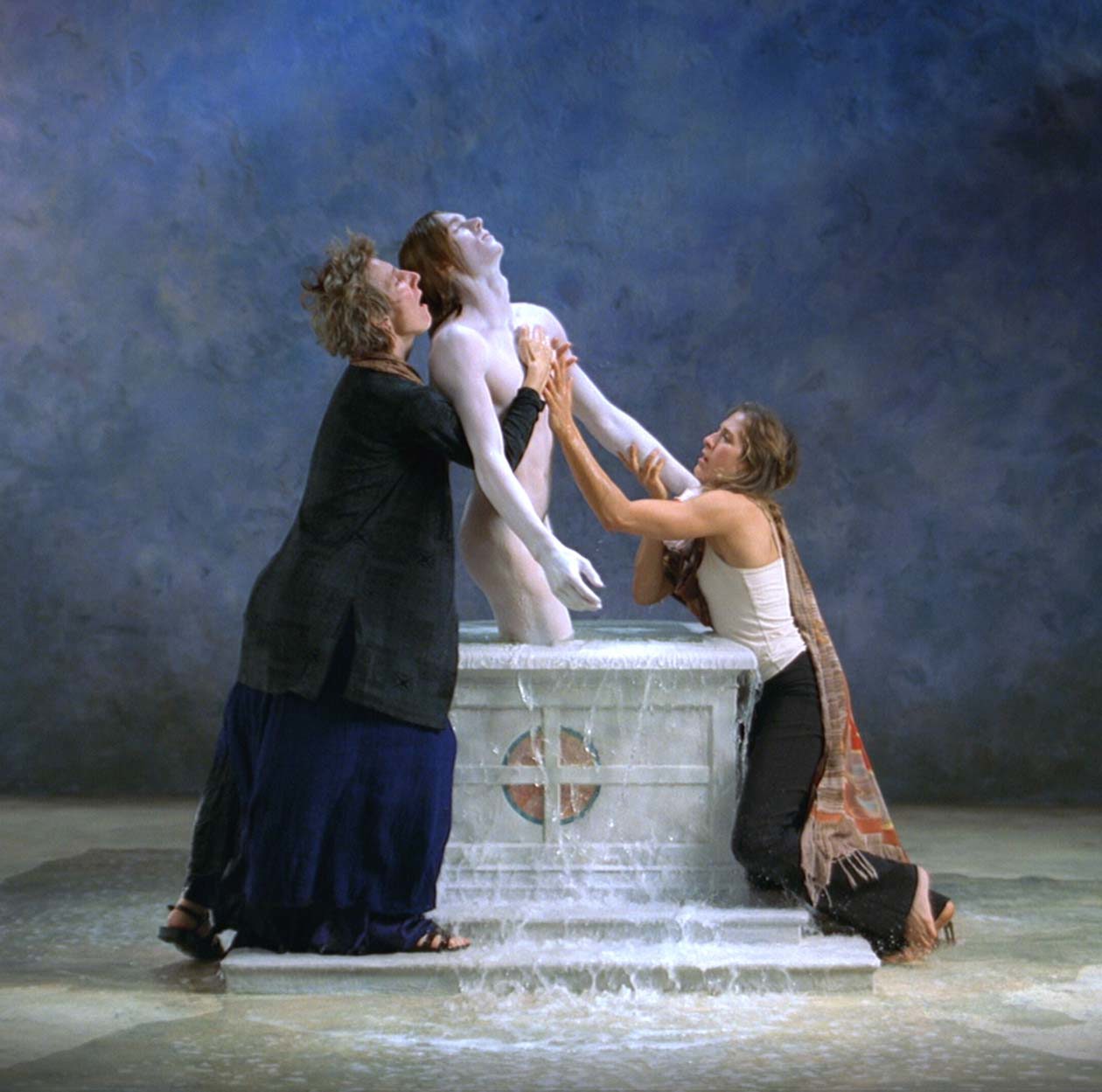 Bill Viola Emergence, 2002 Video installation Color high-definition video rear projection on screen mounted on wall in dark room Projected image size: 213x213 cm 11:40 minutes  Performers: Weba Garretson, John Hay, Sarah Steben Photo: Kira Perov © Bill Viola Studio