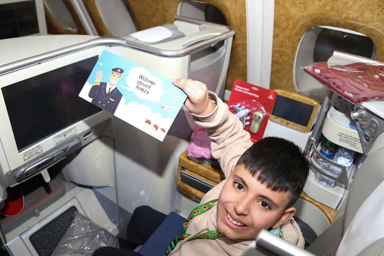 Emirates superfan Humza welcomed onboard. Copyright © Ufficio Stampa Emirates Airlines / The Emirates Group