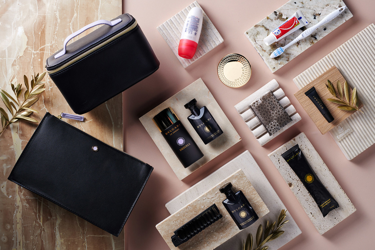 Emirates First Class amenity kits 2023 - lilac and black. Copyright © Ufficio Stampa Emirates Airlines / The Emirates Group  