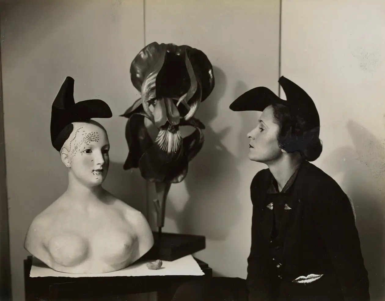André Caillet, Gala wearing Elsa Schiaparelli’s shoe-hat inspired by a Salvador Dalí design, 1938, Vintage gelatin silver print, 19,4 x 25,2 cm © Salvador Dalí, Fundació Gala-Salvador Dalí, Figueres, 2026